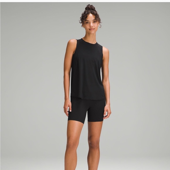 Lululemon sculpt tank. Worn a few times, good used condition. Size 10 no flaws - Picture 2 of 5